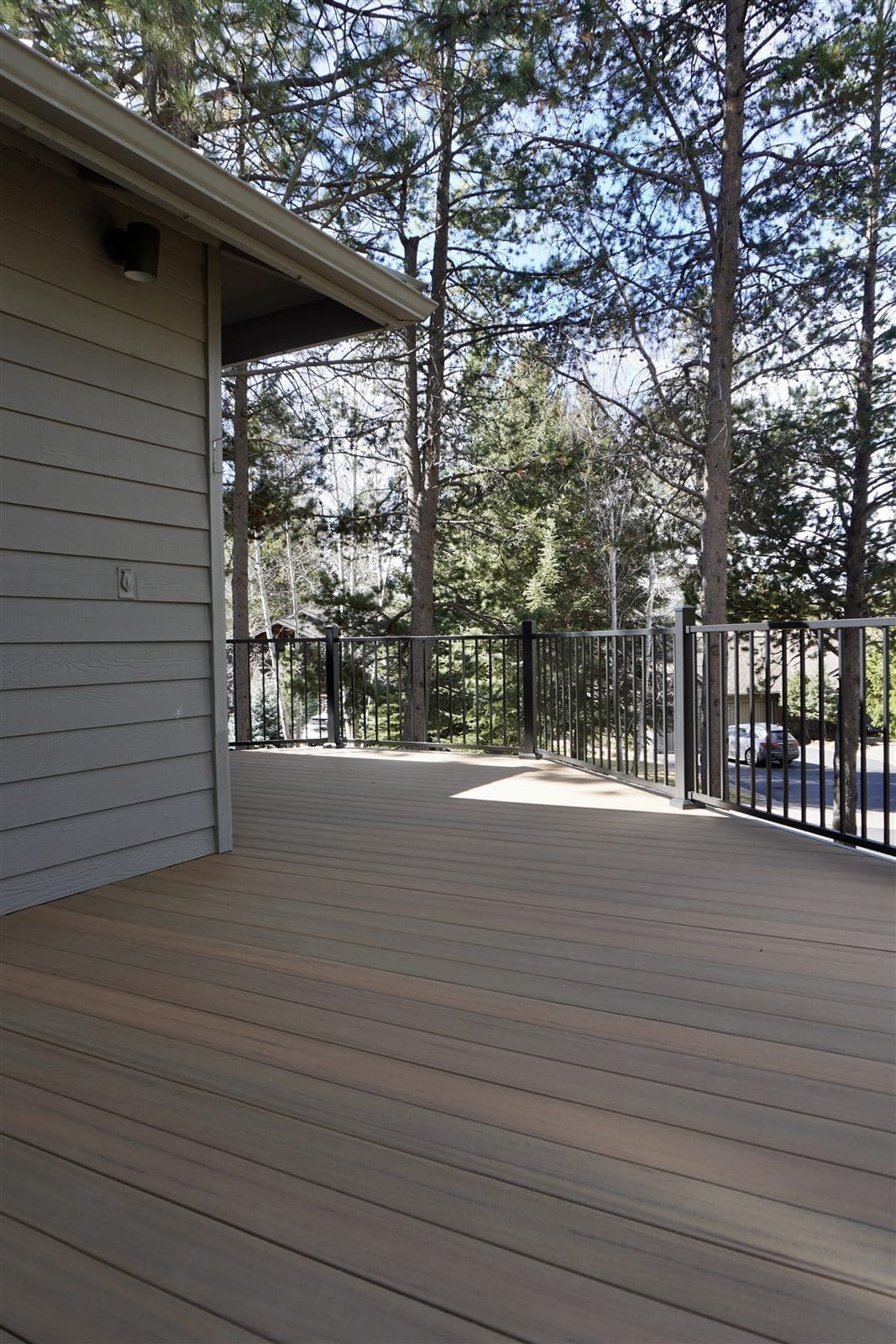 Sunriver Deck Rebuild - composite decking with black rail